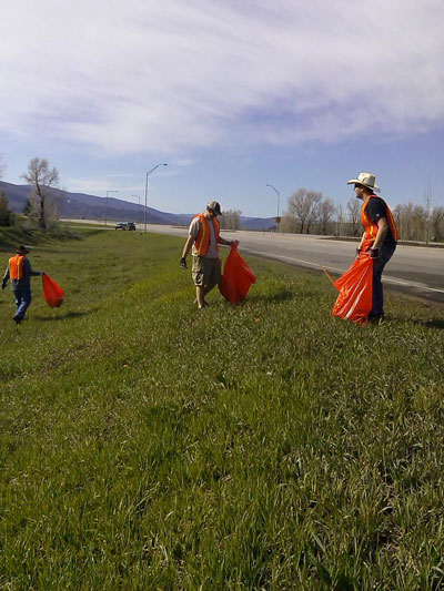 F.M. Light employees cleaning up the road in Steamboat
