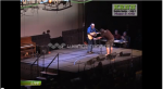 Mel Birch Singing a self-composed song at a festival - sent to F.M. Light and Sons