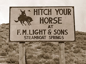 Sign outside Steamboat Springs for F.M. LIght and Sons - western wear store in Steamboat Springs, CO - from an article in Western and English Today